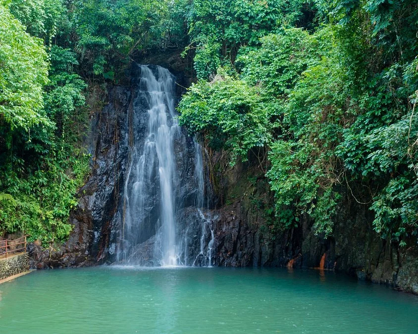 Crystal-clear jungle waters at Taktak Falls