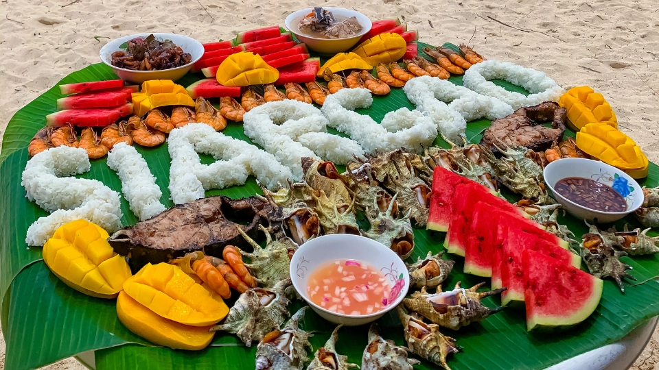 Fresh grilled seafood in Siargao — tuna, squid and crab cooked over charcoal