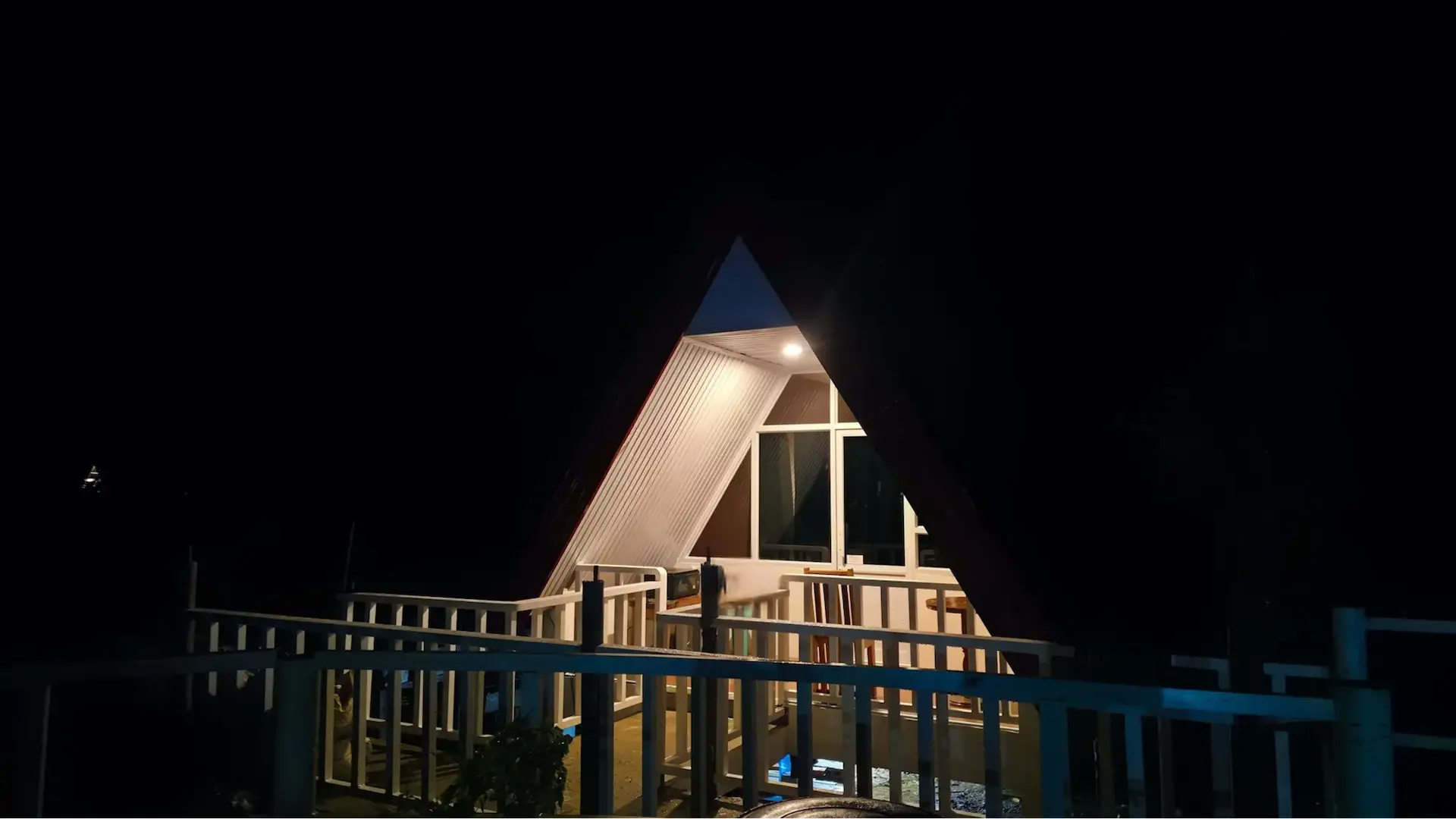 Twin A-Frame Room exterior night time