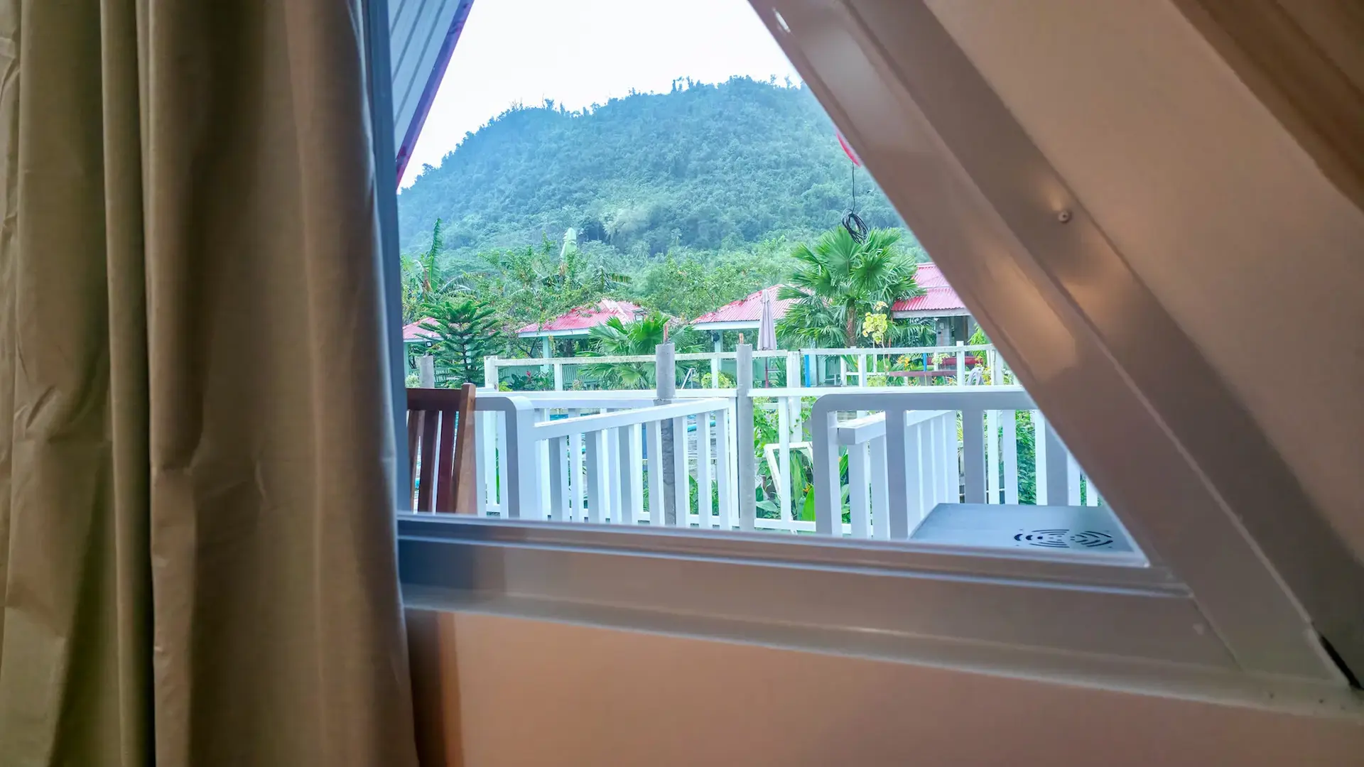 Twin A-Frame Room exterior with porch and mountain views at Mariden Resort in Del Carmen Siargao