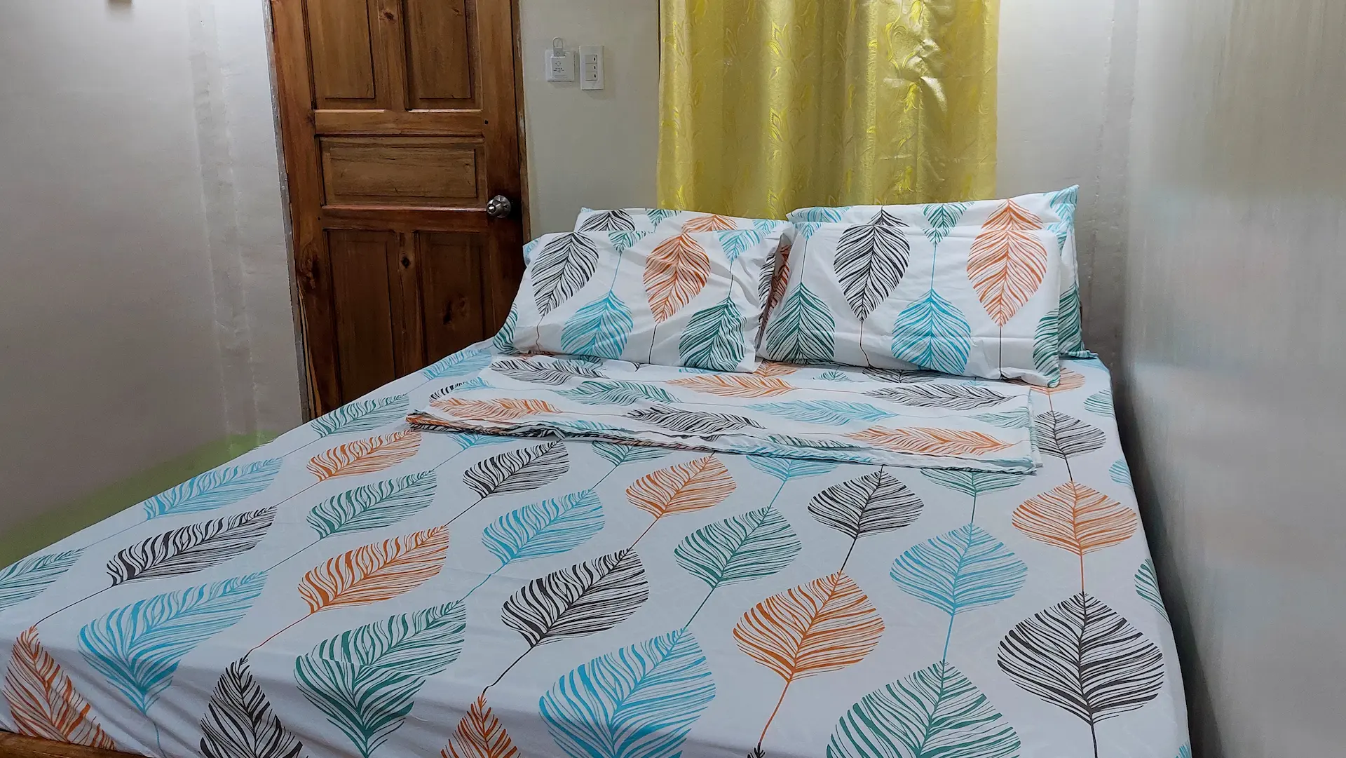 Cozy Double Room interior with double bed, air conditioning, and private bathroom at Mariden Resort Siargao - affordable accommodation for couples